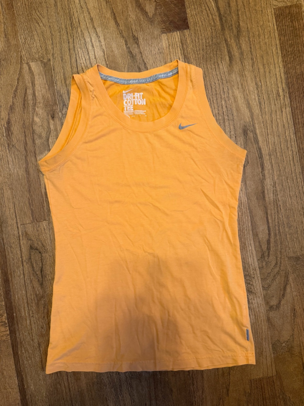 Nike Women’s Orange Tank with Silver Swoosh